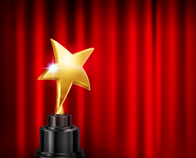 trophy-award-red-curtain-background-realistic-composition-with-image-golden-star-shaped-cup-pedestal_1284-32296