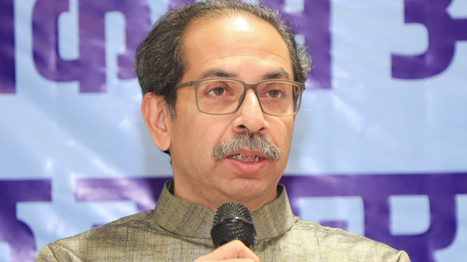 Uddhav T with Mic in Hand Rectangle