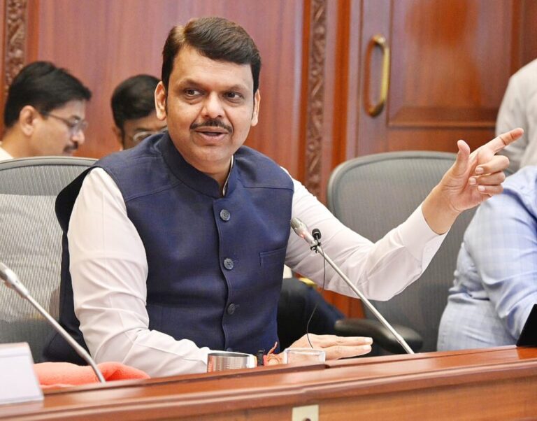 Devendra Fadnavis Hand Action Smiling