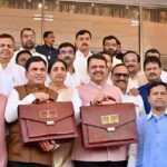 Devendra Fadnavis Holding Bags