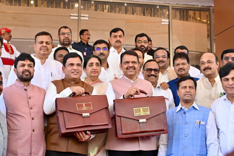 Devendra Fadnavis Holding Bags